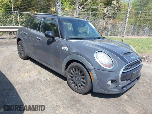 2017 MINI Hardtop 4 Door Cooper S z VIN WMWXU3C52H2D32498, wystawiony jako IAAI lot #42000212 z przebiegiem 70 231 mil mil oraz . Historia ofert i sprzedaży dostępna na DreamBid. Obrazek 1.