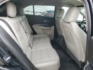 2023 Cadillac XT4 FWD Luxury with VIN 1GYAZAR45PF218684, listed as a Copart auction lot 54427565 with 74,920 mi miles and Salvage Title. Bid and sale history available at carsss.com. Image 11.