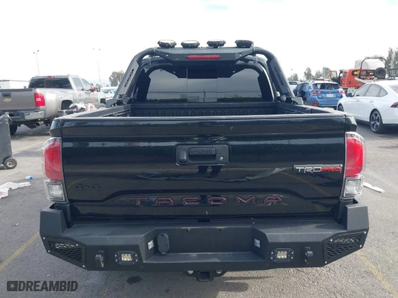2019 Toyota Tacoma 4WD SR with VIN 5TFCZ5AN5KX193668, listed as a IAAI auction lot 41248429 with 60,812 mi miles. Bid and sale history available at carsss.com. Image 16.