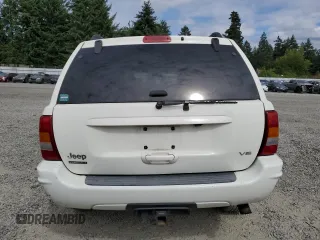 2004 Jeep Grand Cherokee Limited с VIN 1J4GW58N14C208543, выставлен на аукционе Copart как лот 64624035 с пробегом 144 362 миль миль и Списание • Salvage title. История ставок и продаж доступна на DreamBid. Изображение 6.