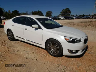 2014 Kia Cadenza Premium with VIN KNALN4D76E5131941, listed as a Copart auction lot 77544574 with 128,514 mi miles and Salvage Title. Bid and sale history available at carsss.com. Image 4.