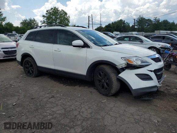 2012 Mazda CX-9 Touring with VIN JM3TB3CV2C0338611, listed as a Copart auction lot 61193625 with 115,817 mi miles and Salvage title. Bid and sale history available at DreamBid. Image 4.