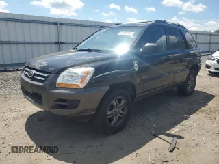 2005 Kia Sportage LX z VIN KNDJE723657121717, wystawiony jako Copart lot #61407575 z przebiegiem Nie podano mil oraz Czysty tytuł • Clean title. Historia ofert i sprzedaży dostępna na DreamBid. Obrazek 1.