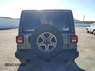 2021 Jeep Wrangler Unlimited Freedom z VIN 1C4HJXDG1MW780092, wystawiony jako Copart lot #82361854 z przebiegiem 43 256 mil mil oraz Szkoda całkowita • Salvage title. Historia ofert i sprzedaży dostępna na DreamBid. Obrazek 6.