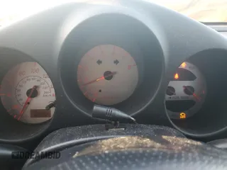 2003 Toyota MR2 z VIN JTDFR320330065914, wystawiony jako Copart lot #88791655 z przebiegiem 125 564 mil mil oraz Szkoda całkowita • Salvage title. Historia ofert i sprzedaży dostępna na DreamBid. Obrazek 9.