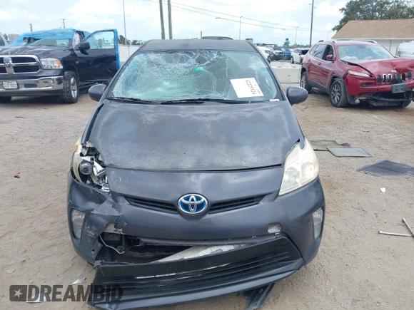 2012 Toyota Prius One z VIN JTDKN3DU0C1592300, wystawiony jako IAAI lot #42225324 z przebiegiem 171 746 mil mil oraz . Historia ofert i sprzedaży dostępna na DreamBid. Obrazek 6.