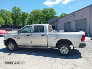 2014 Ram 2500 Tradesman z VIN 3C6TR5CT7EG186099, wystawiony jako IAAI lot #42317585 z przebiegiem 309 687 mil mil oraz . Historia ofert i sprzedaży dostępna na DreamBid. Obrazek 14.