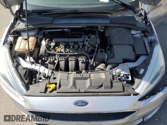 2015 Ford Focus SE with VIN 1FADP3F28FL241020, listed as a Copart auction lot 54559135 with 123,008 mi miles and Salvage title. Bid and sale history available at DreamBid. Image 11.