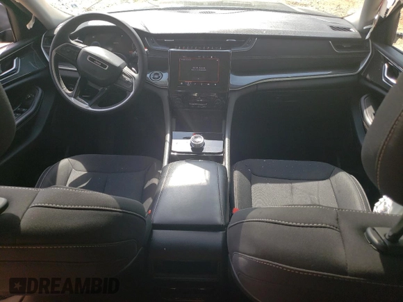 2023 Jeep Grand Cherokee Laredo with VIN 1C4RJGAG0PC534682, listed as a Copart auction lot 56981675 with 16,749 mi miles and Salvage title. Bid and sale history available at DreamBid. Image 8.