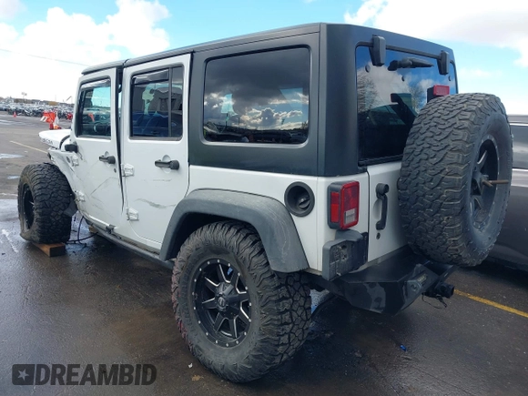 2014 Jeep Wrangler Unlimited Rubicon with VIN 1C4BJWFG2EL264792, listed as a IAAI auction lot 40938380 with 145,886 mi miles. Bid and sale history available at carsss.com. Image 3.
