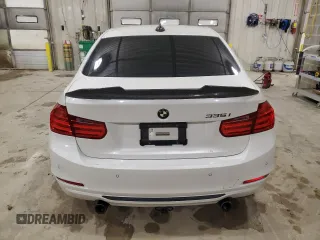 2013 BMW 3 Series 335i with VIN WBA3A9G51DNP36712, listed as a Copart auction lot 52407465 with 117,972 mi miles and Salvage title. Bid and sale history available at DreamBid. Image 6.