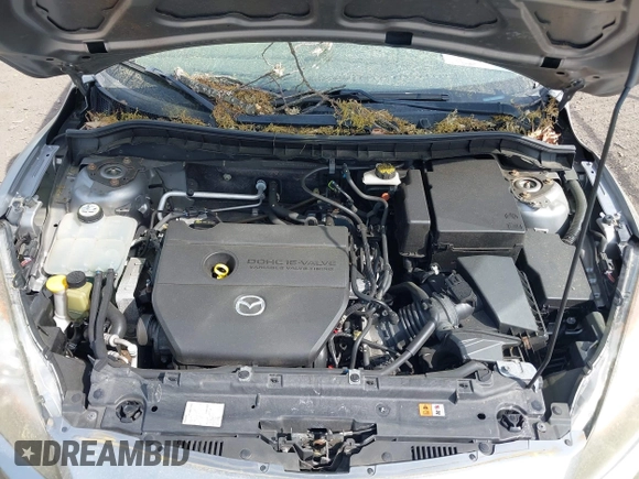 2011 Mazda Mazda3 i Touring with VIN JM1BL1VGXB1372499, listed as a IAAI auction lot 42112283 with 98,564 mi miles. Bid and sale history available at carsss.com. Image 10.
