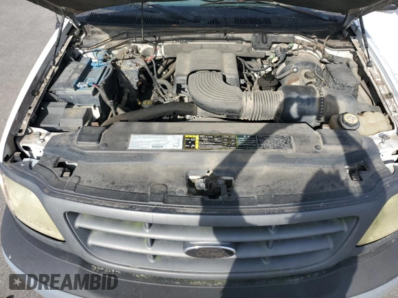 2003 Ford F-150 XL with VIN 1FTRF17W03NA39409, listed as a Copart auction lot 78578434 with 142,299 mi miles and Salvage Title. Bid and sale history available at DreamBid. Image 11.