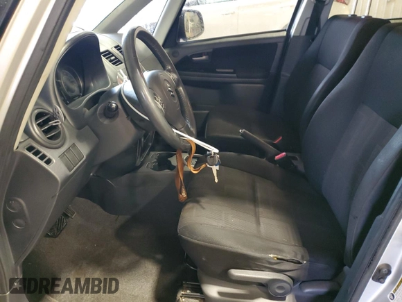 2010 Suzuki SX4 z VIN JS2YB5A31A6302436, wystawiony jako Copart lot #88473455 z przebiegiem 78 839 mil mil oraz Szkody całkowita. Historia ofert i sprzedaży dostępna na DreamBid. Obrazek 7.