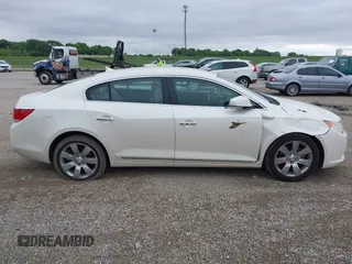 2012 Buick LaCrosse Premium 2 z VIN 1G4GF5E34CF289314, wystawiony jako IAAI lot #42331342 z przebiegiem 300 129 mil mil oraz . Historia ofert i sprzedaży dostępna na DreamBid. Obrazek 13.