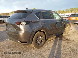 2019 Mazda CX-5 Touring with VIN JM3KFACM8K0694362, listed as a IAAI auction lot 41410185 with 89,443 mi miles. Bid and sale history available at carsss.com. Image 4.