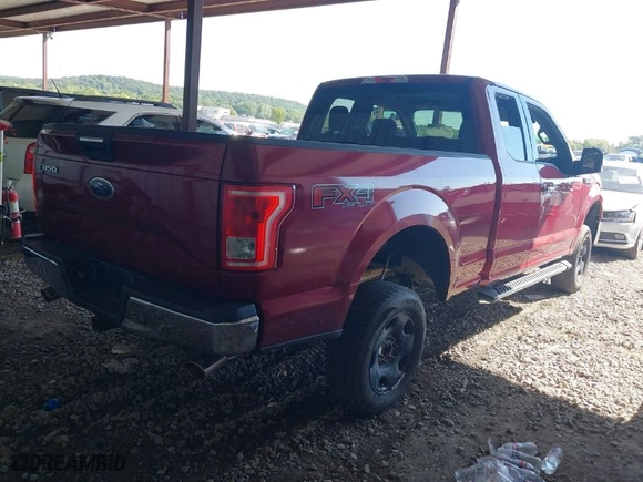 2015 Ford F-150 XLT with VIN 1FTFX1EF7FFA94960, listed as a IAAI auction lot 40268057 with 143,717 mi miles. Bid and sale history available at carsss.com. Image 4.