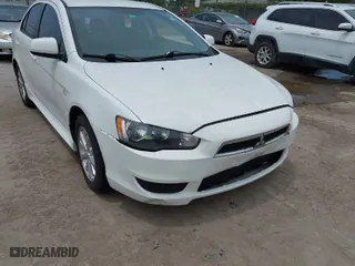 2012 Mitsubishi Lancer ES with VIN JA32U2FU5CU029556, listed as a IAAI auction lot 42104297 with 111,821 mi miles. Bid and sale history available at carsss.com. Image 1.