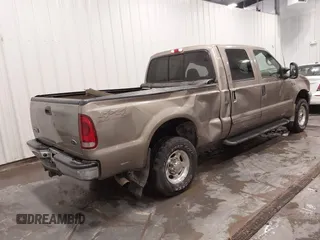 2002 Ford F-250 XL z VIN 1FTNW21F12EB82526, wystawiony jako IAAI lot #41937454 z przebiegiem 133 291 mil mil oraz . Historia ofert i sprzedaży dostępna na DreamBid. Obrazek 4.