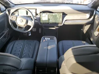 2022 Rivian R1T Adventure Package with VIN 7FCTGAAA5NN007049, listed as a Copart auction lot 74857974 with 27,481 mi miles and Salvage Title. Bid and sale history available at carsss.com. Image 8.