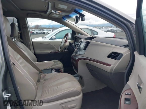 2011 Toyota Sienna XLE with VIN 5TDDK3DCXBS003666, listed as a IAAI auction lot 41807992 with 156,699 mi miles. Bid and sale history available at carsss.com. Image 5.