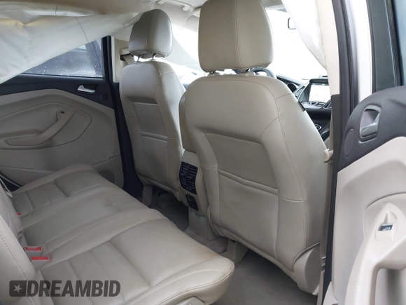 2016 Ford Escape Titanium with VIN 1FMCU9JX9GUA62674, listed as a IAAI auction lot 41838996 with 135,105 mi miles. Bid and sale history available at carsss.com. Image 8.