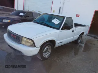 1999 GMC Sonoma with VIN 1GTCS1448XK513781, listed as a IAAI auction lot 41604322 with 216,174 mi miles. Bid and sale history available at carsss.com. Image 2.