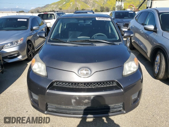 2014 Scion xD with VIN JTKKUPB41E1046114, listed as a Copart auction lot 54599235 with 125,979 mi miles and Salvage title. Bid and sale history available at DreamBid. Image 5.