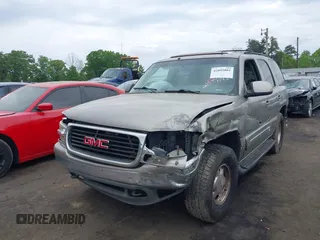 2002 GMC Yukon SLT z VIN 1GKEK13ZX2J247186, wystawiony jako IAAI lot #42095882 z przebiegiem 271 728 mil mil oraz . Historia ofert i sprzedaży dostępna na DreamBid. Obrazek 2.