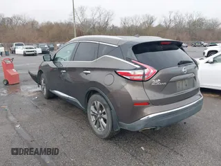 2016 Nissan Murano Platinum with VIN 5N1AZ2MG6GN106877, listed as a IAAI auction lot 41447698 with 124,451 mi miles and . Bid and sale history available at DreamBid. Image 3.