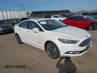 2017 Ford Fusion Hybrid Titanium с VIN 3FA6P0RU7HR148191, выставлен на аукционе IAAI как лот 42167708 с пробегом 72 708 миль миль и . История ставок и продаж доступна на DreamBid. Изображение 1.