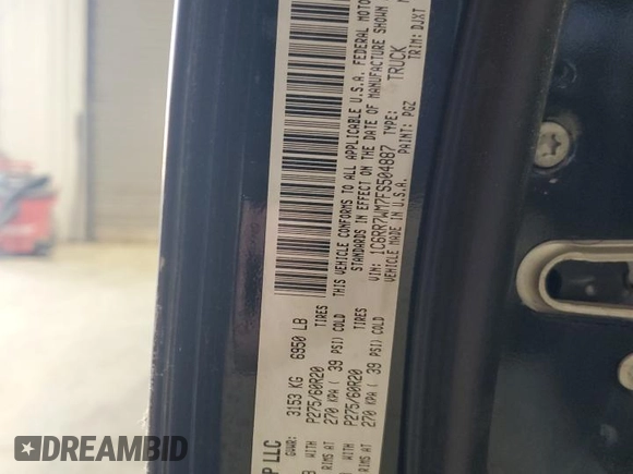 2015 Ram 1500 Laramie Limited with VIN 1C6RR7WM7FS504887, listed as a Copart auction lot 64129555 with 118,599 mi miles and Clean title. Bid and sale history available at DreamBid. Image 12.
