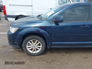2015 Dodge Journey SXT with VIN 3C4PDDBG0FT533014, listed as a IAAI auction lot 42199884 with 190,938 mi miles and . Bid and sale history available at DreamBid. Image 6.
