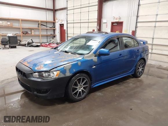 2009 Mitsubishi Lancer ES with VIN JA3AU26U29U036243, listed as a IAAI auction lot 41952044 with 181,650 mi miles. Bid and sale history available at carsss.com. Image 2.