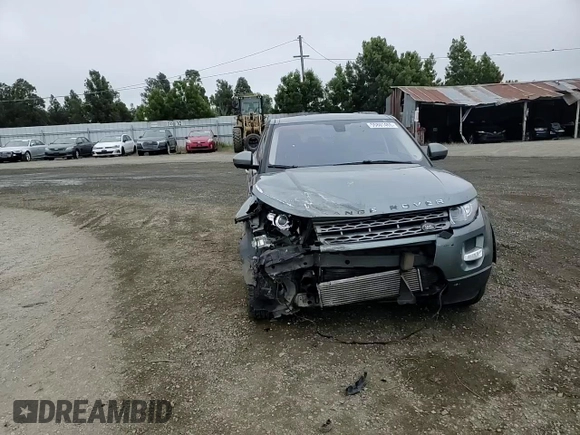 2015 Land Rover Range Rover Evoque Pure Premium z VIN SALVR2BG6FH012643, wystawiony jako Copart lot #55801455 z przebiegiem 97 386 mil mil oraz Szkoda całkowita • Salvage title. Historia ofert i sprzedaży dostępna na DreamBid. Obrazek 15.