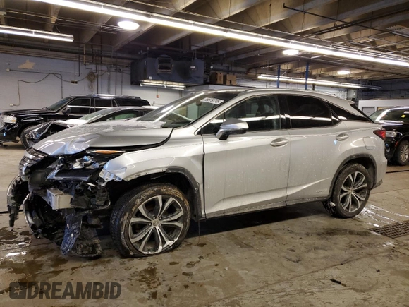 2016 Lexus RX 450h with VIN 2T2BGMCA2GC001405, listed as a Copart auction lot 45579795 with 129,086 mi miles and Salvage title. Bid and sale history available at DreamBid. Image 1.