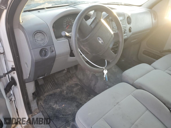 2007 Ford F-150 XL with VIN 1FTRF12W27NA28473, listed as a Copart auction lot 87459744 with Not Provided miles and Salvage Title. Bid and sale history available at carsss.com. Image 8.