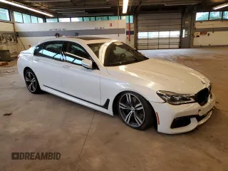 2017 BMW 7 Series with VIN WBA7F2C36HG422997, listed as a Copart auction lot 56149494 with Not Provided miles and Salvage Title. Bid and sale history available at DreamBid. Image 4.