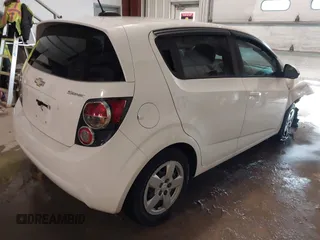 2016 Chevrolet Sonic LS with VIN 1G1JA6SH1G4174680, listed as a IAAI auction lot 41299210 with 90,210 mi miles and . Bid and sale history available at DreamBid. Image 4.