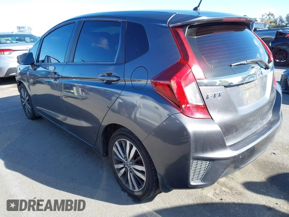 2015 Honda Fit EX-L z VIN 3HGGK5H89FM774299, wystawiony jako IAAI lot #41793448 z przebiegiem 142 228 mil mil oraz . Historia ofert i sprzedaży dostępna na DreamBid. Obrazek 3.
