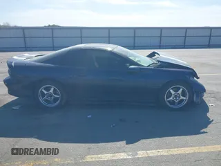 2001 Chevrolet Camaro Z28 z VIN 2G1FP22G312146719, wystawiony jako IAAI lot #42228792 z przebiegiem 134 142 mil mil oraz . Historia ofert i sprzedaży dostępna na DreamBid. Obrazek 13.