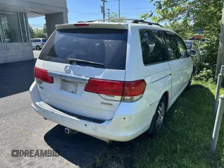 2009 Honda Odyssey Touring with VIN 5FNRL38819B025126, listed as a IAAI auction lot 42219263 with 187,191 mi miles and . Bid and sale history available at carsss.com. Image 4.