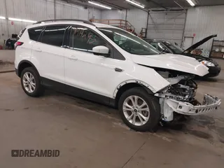 2018 Ford Escape SE z VIN 1FMCU9GD2JUB17518, wystawiony jako IAAI lot #41919245 z przebiegiem 102 626 mil mil oraz . Historia ofert i sprzedaży dostępna na DreamBid. Obrazek 1.