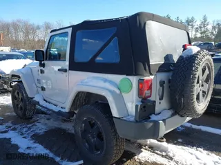 2012 Jeep Wrangler Arctic with VIN 1C4GJWBG9CL290847, listed as a IAAI auction lot 41281316 with 106,473 mi miles. Bid and sale history available at carsss.com. Image 3.