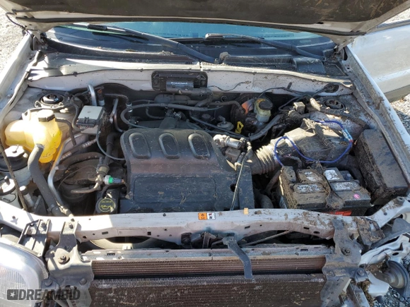 2003 Ford Escape XLT Popular 2 with VIN 1FMYU93193KC40989, listed as a Copart auction lot 50424235 with 92,238 mi miles and Salvage Title. Bid and sale history available at carsss.com. Image 12.