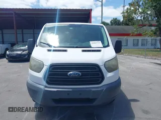 2015 Ford Transit Cargo with VIN 1FTNE1YM7FKA95206, listed as a IAAI auction lot 42083733 with 195,306 mi miles. Bid and sale history available at carsss.com. Image 12.