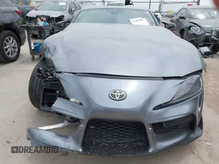 2021 Toyota Supra 2.0 with VIN WZ1DB2C0XMW038679, listed as a IAAI auction lot 42407988 with 76,316 mi miles and . Bid and sale history available at DreamBid. Image 13.