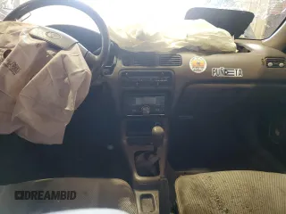 1996 Toyota Tercel DX z VIN JT2BC52L7T7044201, wystawiony jako Copart lot #77190074 z przebiegiem Nie podano mil oraz Szkoda całkowita • Salvage title. Historia ofert i sprzedaży dostępna na DreamBid. Obrazek 8.