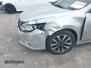 2017 Nissan Altima SV with VIN 1N4AL3AP7HC188945, listed as a IAAI auction lot 42111225 with 157,185 mi miles and . Bid and sale history available at carsss.com. Image 6.