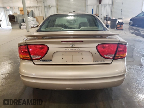 2002 Oldsmobile Alero GL1 z VIN 1G3NL52F52C133589, wystawiony jako Copart lot #77093824 z przebiegiem 150 353 mil mil oraz Szkoda całkowita • Salvage title. Historia ofert i sprzedaży dostępna na DreamBid. Obrazek 6.